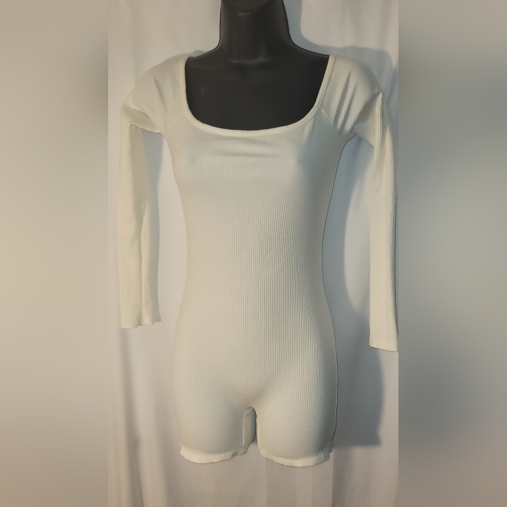 Fashion Nova Cream Long Sleeve Jumpsuit